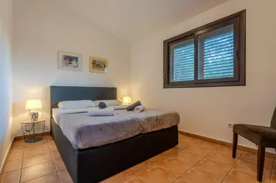 Cama o camas de una habitación en Club Villamar - Nirwana 6