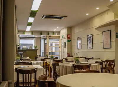 Un restaurante o sitio para comer en CozyCatalonia - Suite Apartment at Can Setmanes Central Blanes