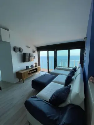 Cama o camas de una habitación en Primera línea de mar, vistas de barco