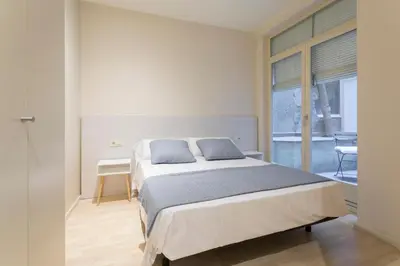 Cama o camas de una habitación en Bravissimo Cort Reial-1A