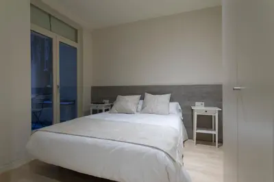 Cama o camas de una habitación en Bravissimo Cort Reial-3B
