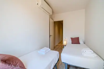 Cama o camas de una habitación en Flateli- Plaça Catalunya 2-1