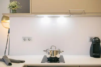 Una cocina o zona de cocina en Flateli - Exclusivo Plaça Catalunya 4-1