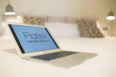 Cama o camas de una habitación en Flateli -Plaça Catalunya 3-2