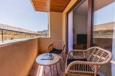 Un balcón o terraza de Bravissimo Domènica, 2 bedrooms and balcony