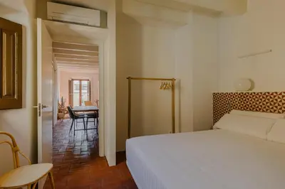 Cama o camas de una habitación en Flateli Santa Clara 11