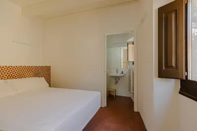 Cama o camas de una habitación en Flateli Santa Clara 21