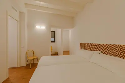 Cama o camas de una habitación en Flateli Santa Clara 12