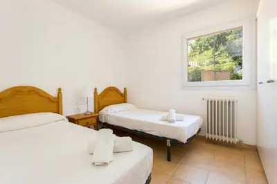 Cama o camas de una habitación en Luxury Villa in front of the beach POPETA
