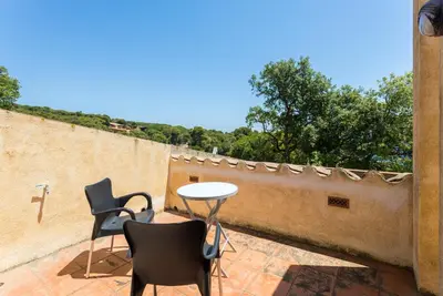 Un balcón o terraza de Luxury Villa in front of the beach POPETA